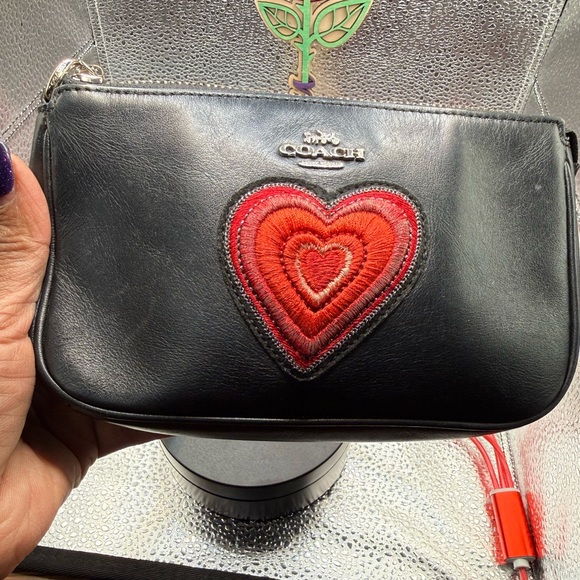 Coach Handbags - Coach Nolita 19 wristlet/pouch with a red heart appliqué.